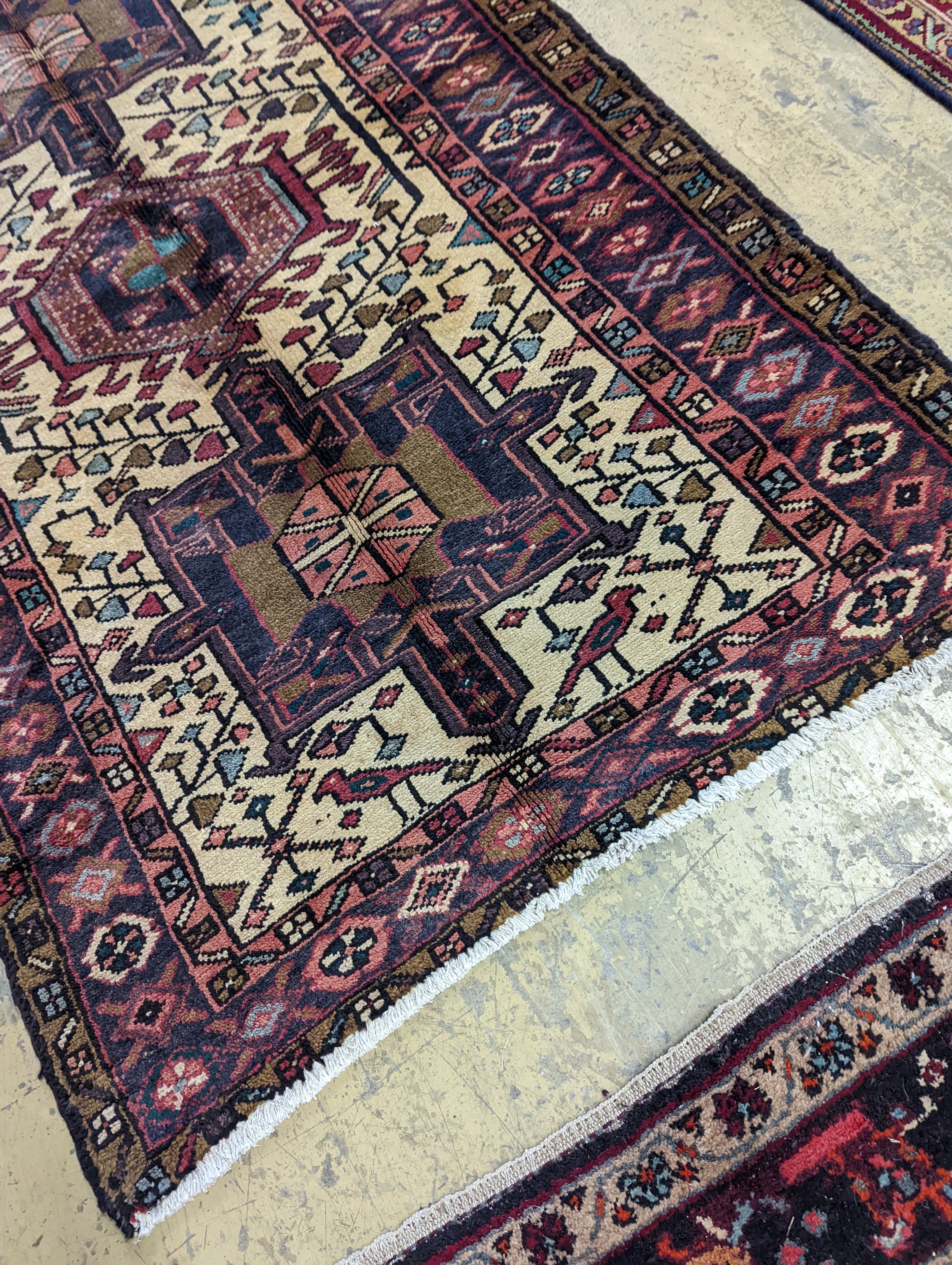 A Karajeh hall carpet, 320 x 106cm